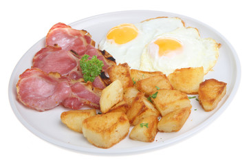 Bacon with fried eggs and sauteed potatoes