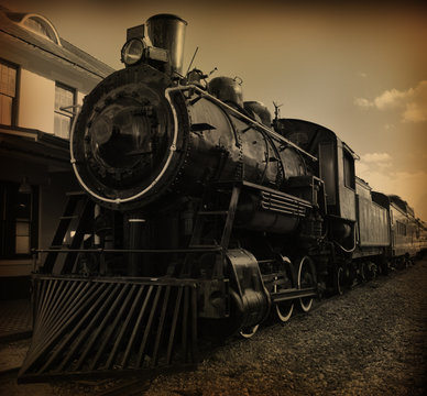 Fototapeta Sepia toned shot of old fashioned steam train