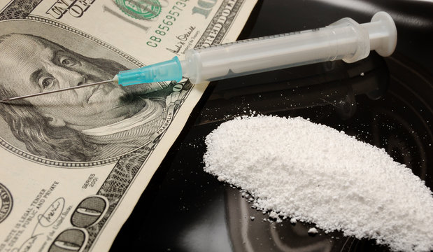 narcomania concept - heroin,syringe,money