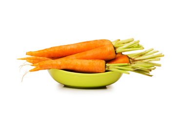 Fresh carrots isolated on the white background