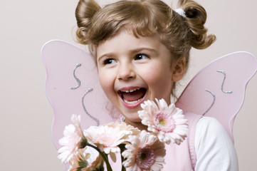 Happy fairy with gerber bouquet