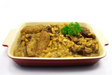 Studio shot of a cooked cassoulet in its dish