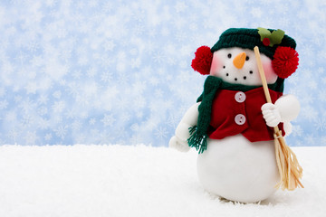 Snowman wearing scarf on snowflake background