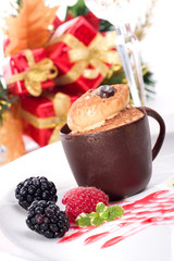 Fototapeta na wymiar Tiramisu cake in chocolate cup served with fresh raspberry