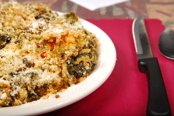 mixed green vegetables on a white plate on a table