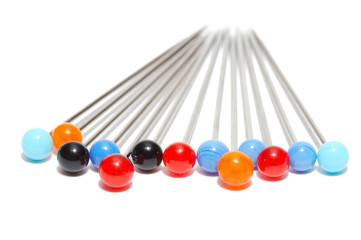close up of color pins