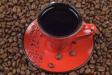 red and black eastern cup of coffee