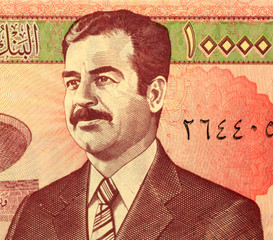 Saddam Hussein on 10,000 dinars banknote from Iraq