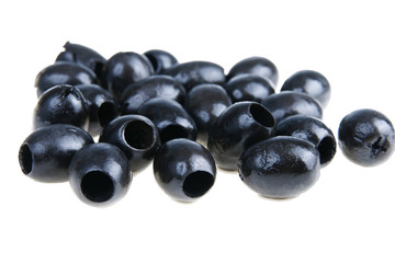 black olive isolated on white background close-up.