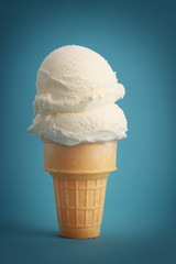 vanilla ice cream cone, blue background