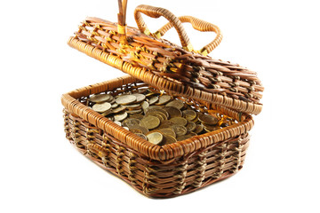 Coins in a casket. Isolated on a white background