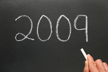 Wring the year 2009 on a blackboard.