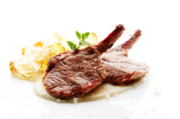 Grilled lamb cutlet on white plate