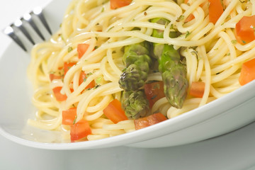 natural fresh spaghetti with tomato sauce and asparagus