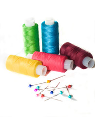 Coils of colour threads isolated on white (selective focus)