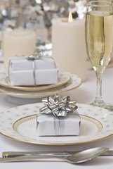 Table setting with Christmas theme and gifts