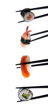 Stock Photo: Sushi with chopsticks isolated on white