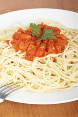 Freshly cooked Spaghetti with tomato sauce. Shallow DOF
