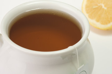 closeup of a white cup of tea