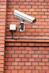 surveillance security camera on wall