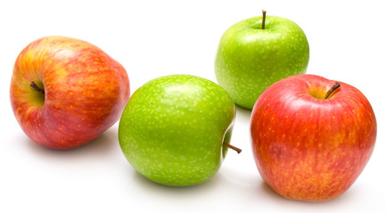 Red and green apples on the white background. Isolated.
