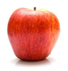 The ripe juicy red apple. Isolation on white.