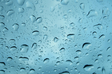 Rain drops on glass window.