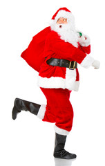 Happy running Christmas Santa. Isolated over white background.