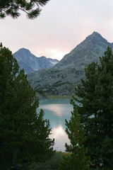 Fototapeta na wymiar Mountain lake and sunset