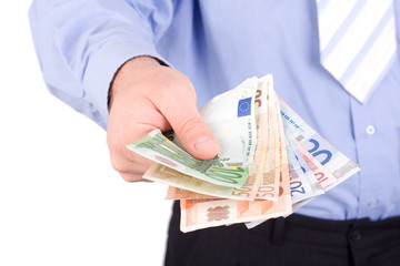 euros in a hands isolated on white