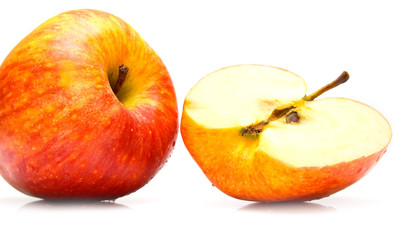 The ripe juicy red apples. Isolation on white.