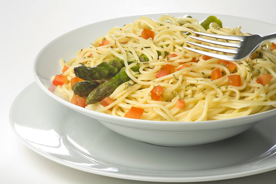 natural fresh spaghetti with tomato sauce and asparagus