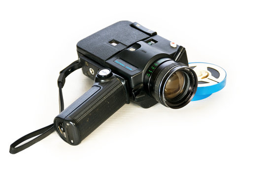 Super 8 movie camera and developed film.