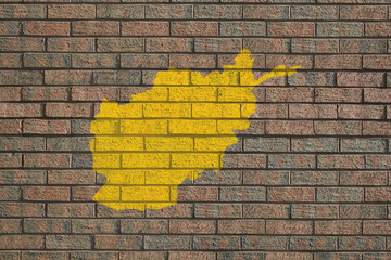 yellow Afghan map painted on brick wall illustration