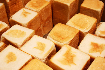 Close up of many bread stacking together.
