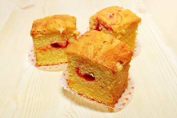 Close up of three sponge cake slices.