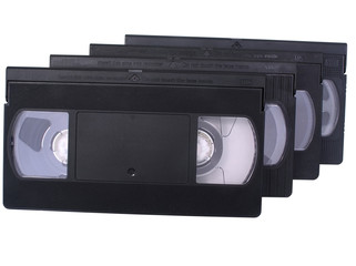 Retro VHS video tapes, isolated in white.
