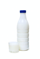 Bottle and glass with milk isolated on white
