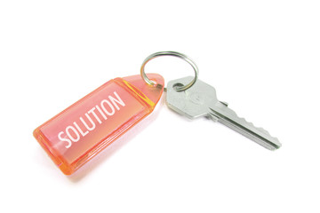 Key with Solution on Isolated White Background