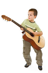 Little boy playing acoustic guitar - isolated