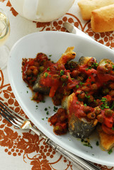 Cavedano al forno con piselli - Ricette del Trentino Alto Adige