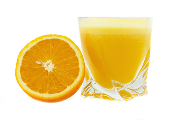 Glass of orange juice and orange on a white