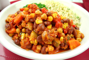 Delicious vegetable and lentil hotpot with couscous.