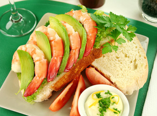 Shrimp and avocado open sandwich with lemon mayonnaise.