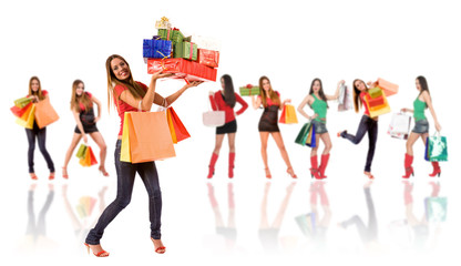 Obraz premium Shopping woman with bag and gift boxes
