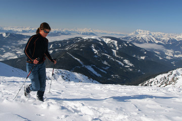 Fototapeta na wymiar Snowshoeing in the mountains