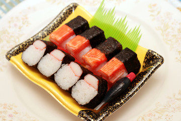 close up of a japanese  kani or crabstick maki.