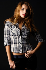 Beautiful woman in cheked shirt