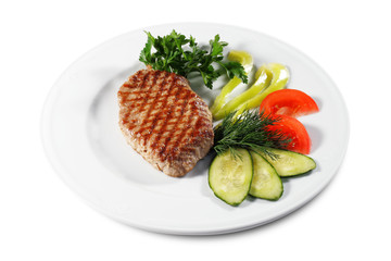Pork Steak with Vegetables. Isolated on White Background