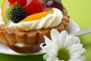 Cake with fresh fruits and flower